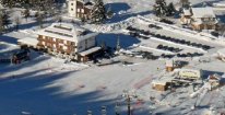 Týdenní lyžování v italských Alpách s polopenzí a skipasem od 1.2. do 8.2.2020 - ubytování přímo u sjezdovky